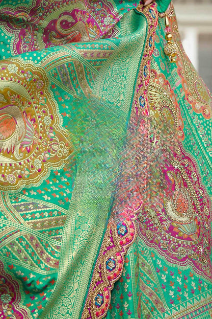 Green and Pink Banarasi Silk Lehenga with Zarkan Codding Work - Femenica