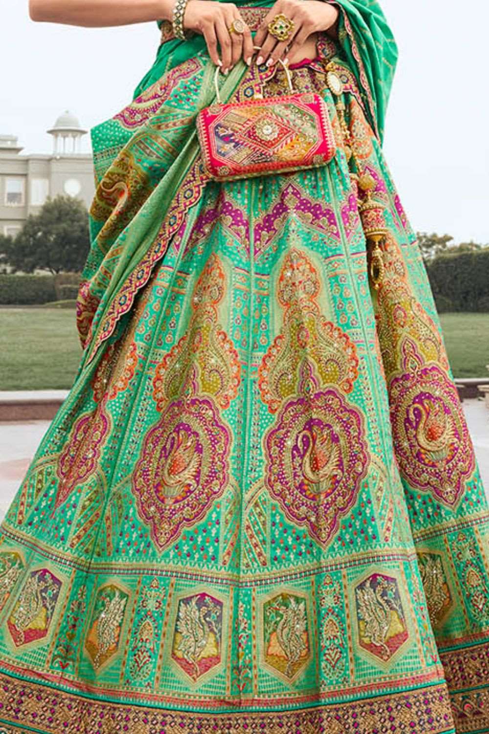 Green and Pink Banarasi Silk Lehenga with Zarkan Codding Work - Femenica