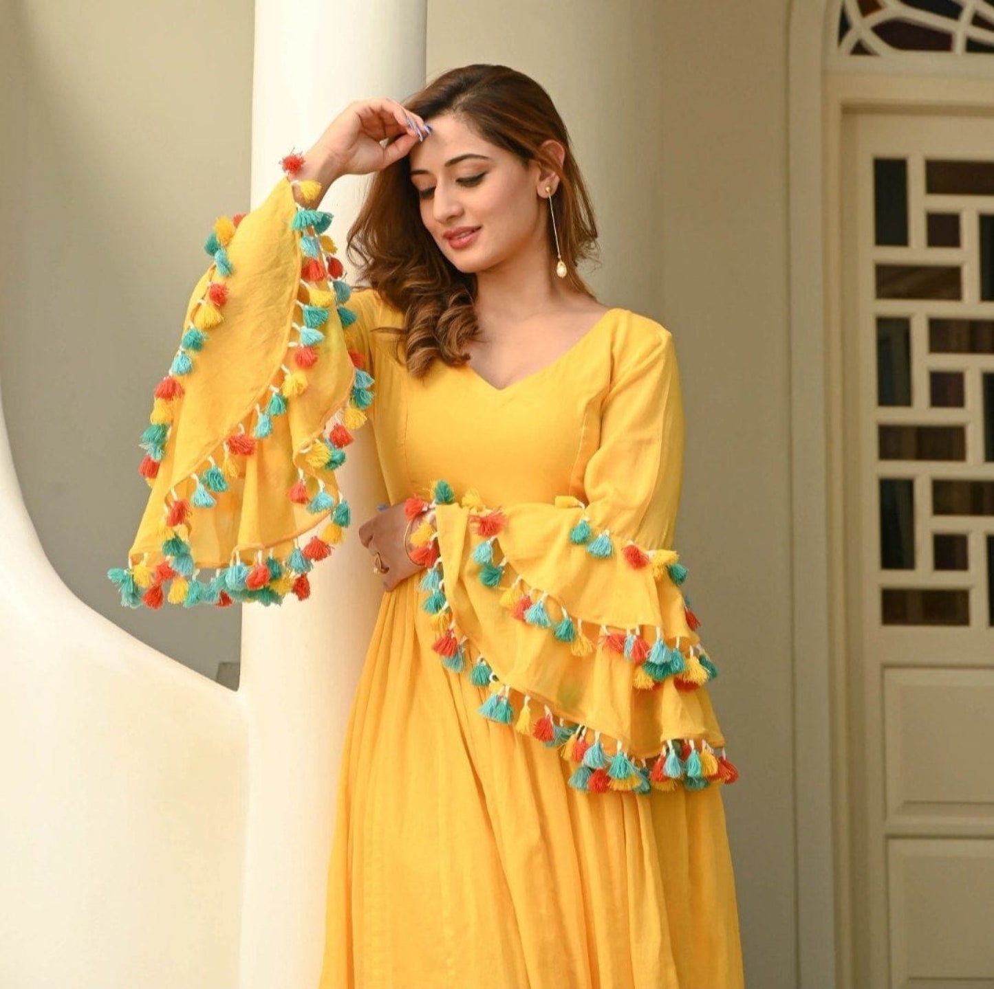 Yellow Georgette Fancy Pattern flair Gown - Femenica