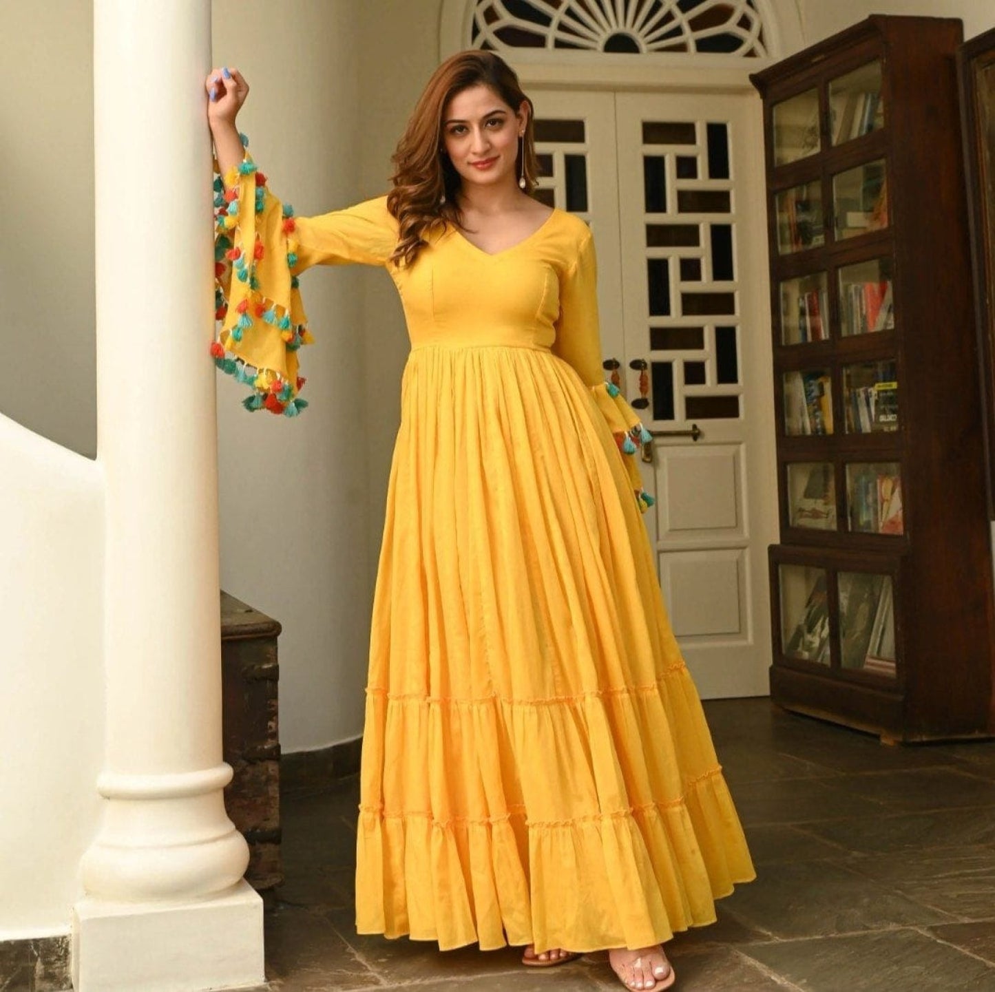 Yellow Georgette Fancy Pattern flair Gown - Femenica