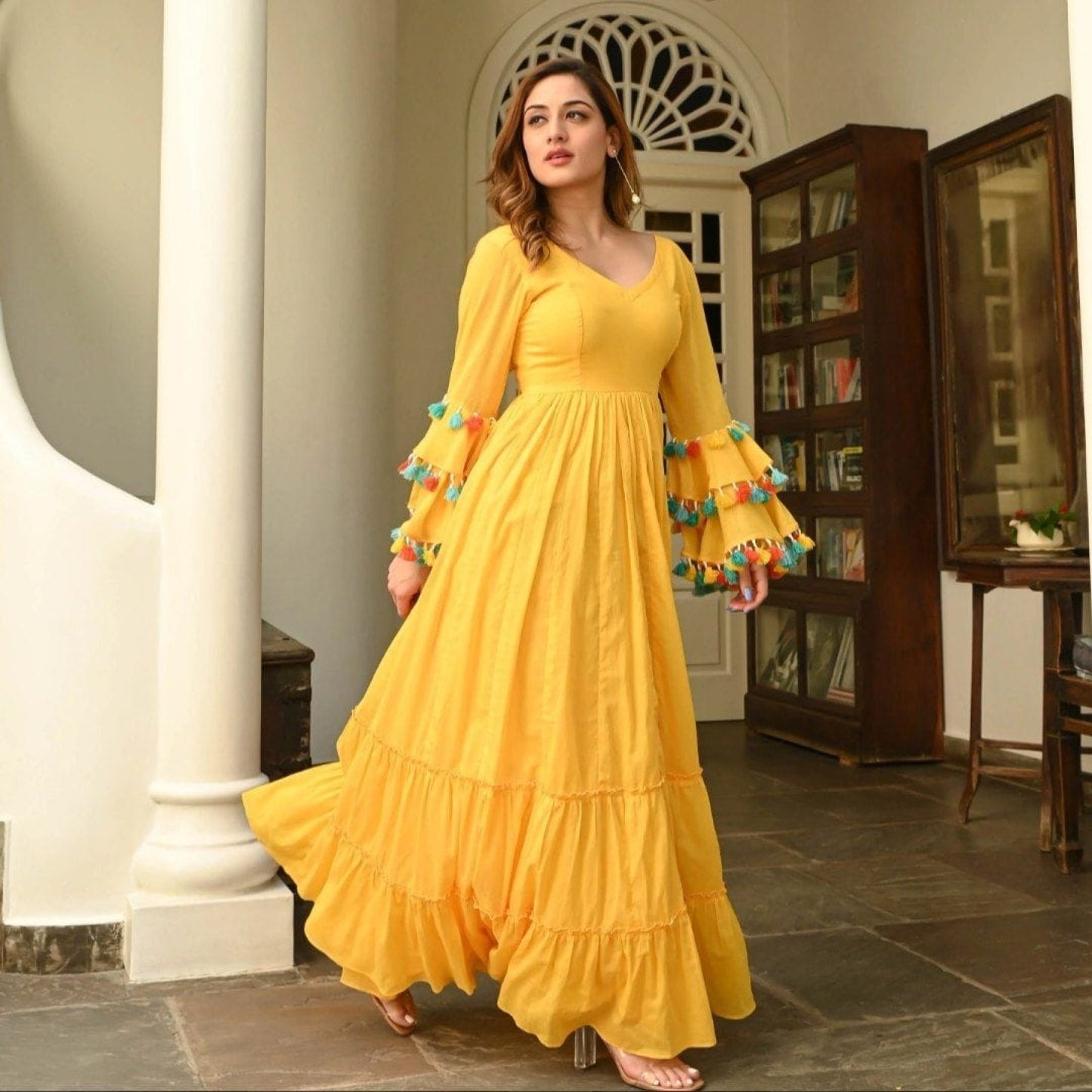 Yellow Georgette Fancy Pattern flair Gown - Femenica